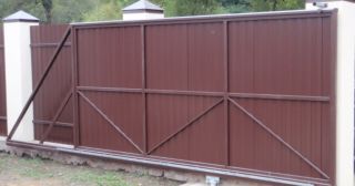 Купить откатные ворота из профнастила Краснотурьинск, цена от 1729 руб.